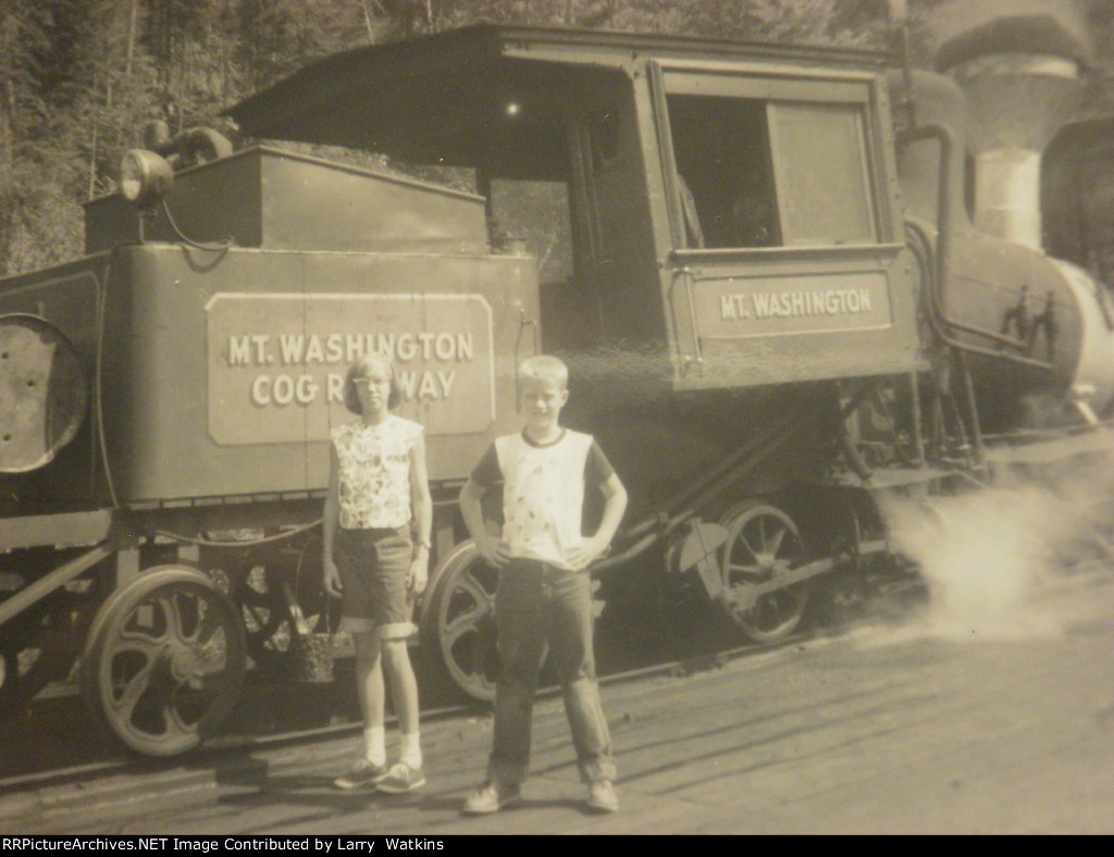 My sister and i ready to work on the railroad.